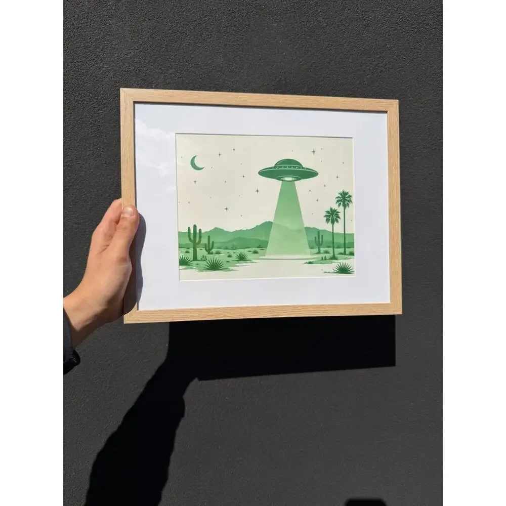 Framed Green UFO Desert Night Scene Art Print — Natural Wood Frame